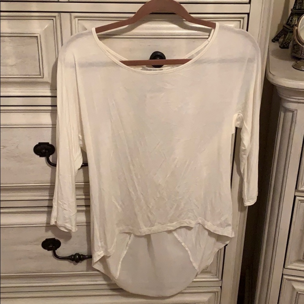 White ISSI 3/4 sleeve tunic with see through back